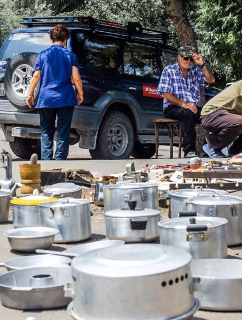 poverty-old-man-dishes-junk-poorness-garage-sale-flea-markets-old-dishes-poor-people_t20_VLL7p3